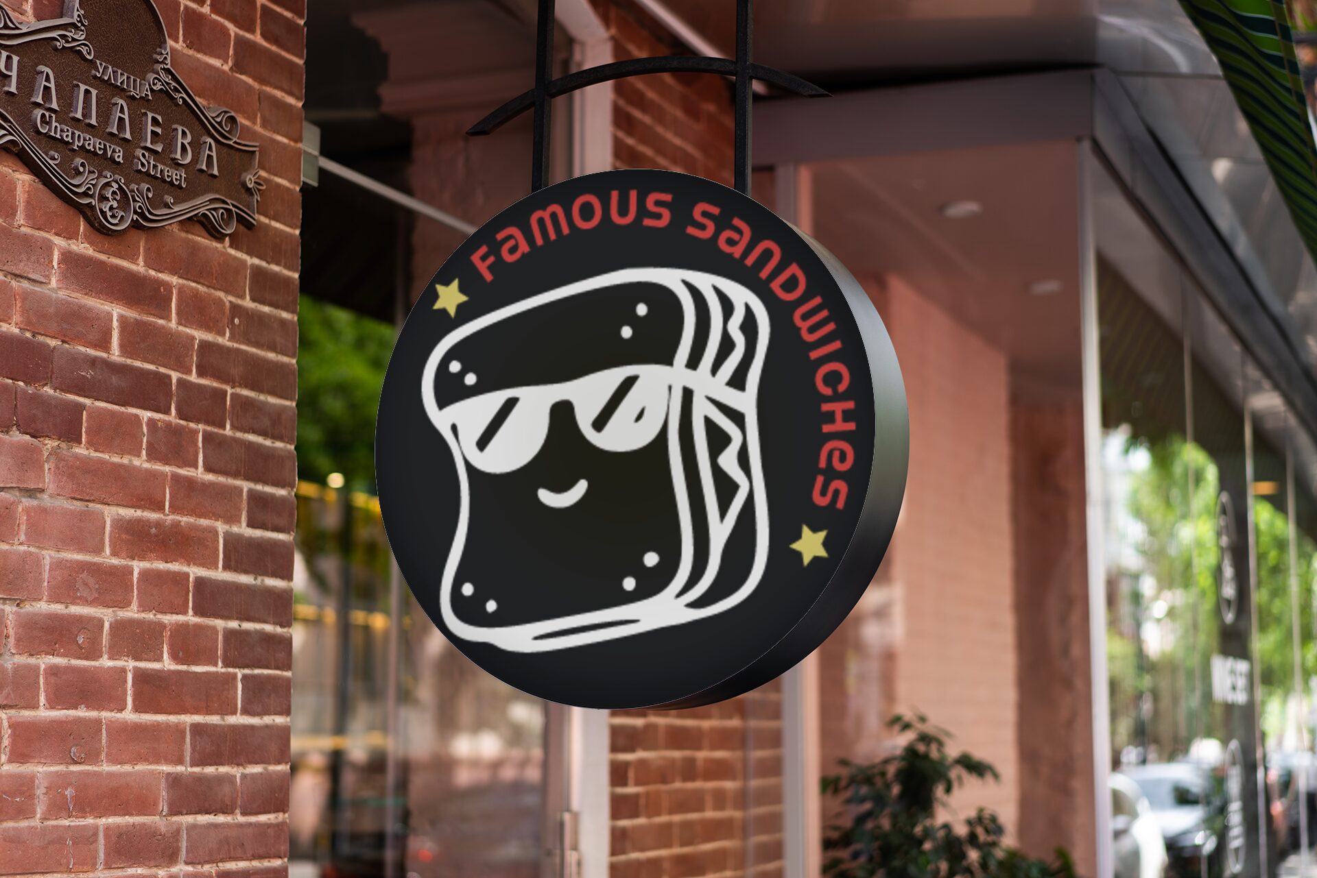mockup-of-a-circular-sign-by-a-brick-wall-store-2220-el1